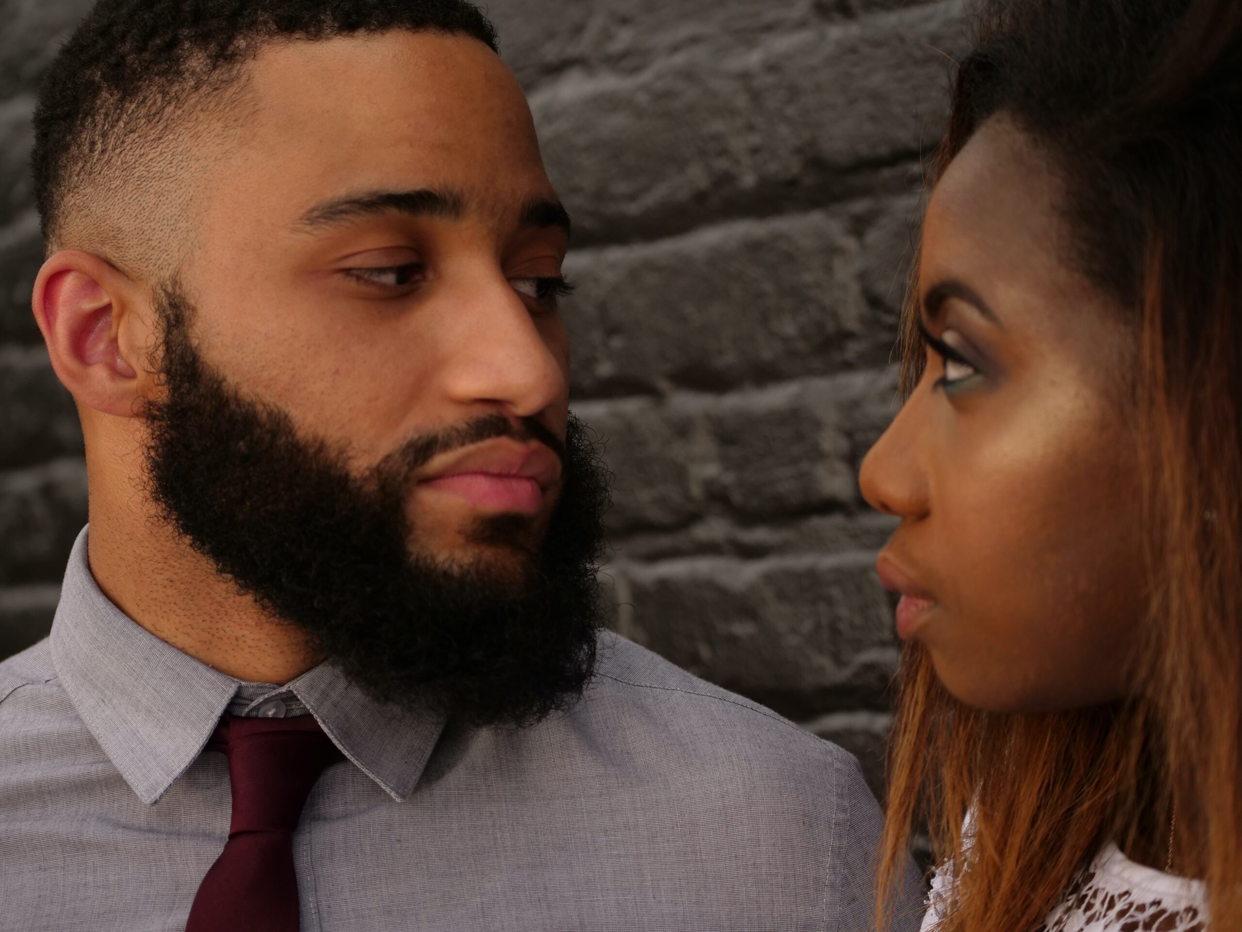 A close up of a couple looking at each other. Learn how a relationship therapist in Brooklyn, NY can offer support by searching for “therapist Brooklyn NY” or therapy in Brooklyn, NY