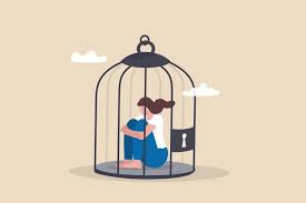 An illustration of a person curled up inside a locked birdcage, powerfully depicting the trapped, isolated feeling that comes with feeling stuck in Brooklyn, NY when personal growth creates distance from the people closest to you. A therapist for young adults in Brooklyn, NY can help you identify the patterns keeping you confined and find a way forward that feels true to who you're becoming. 