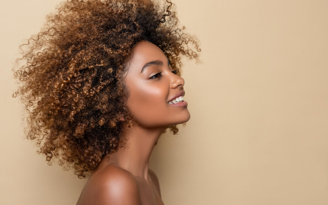 Side profile of black woman smiling. Finding the right support matters for your wellbeing. See if private pay therapy in Brooklyn, NY is right for you. Call now and find a private pay therapist near me today!