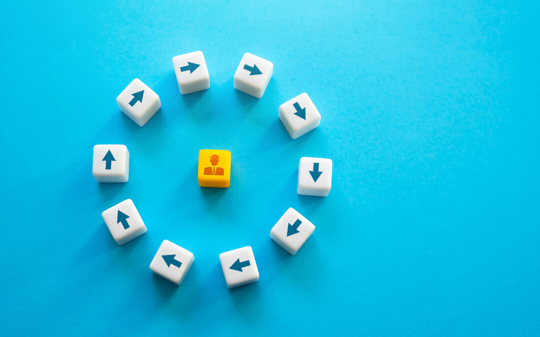 White cubes with arrows form a circle around a single yellow block—stuck-in-a-loop energy. A reminder that therapy for young adults in Brooklyn, NY can create momentum. Try young adult therapy in Brooklyn, NY with a therapist for young adults in Brooklyn, NY, including online therapy in New York.