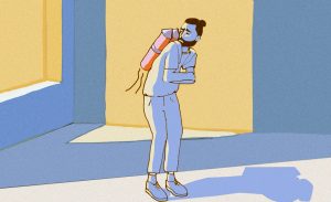An illustration shows a young man standing frozen on a sidewalk with a jetpack strapped to his back, ready for takeoff but unable to move. It's a fitting picture of feeling stuck in Brooklyn, NY, wanting to move forward but staying in place. A young adult therapist in Brooklyn, NY or an attachment therapist in Brooklyn, NY can help untangle what's holding you back.